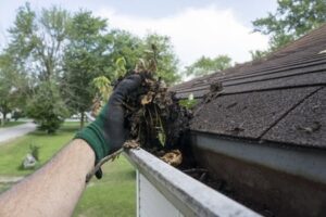 cleaning gutters and downspouts